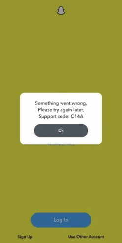  A screenshot of the Snapchat login screen displaying an error message saying, "Something went wrong. Please try again later. Support code: C14A." The error message has an "OK" button and options to "Sign Up" or "Use Other Account" at the bottom.