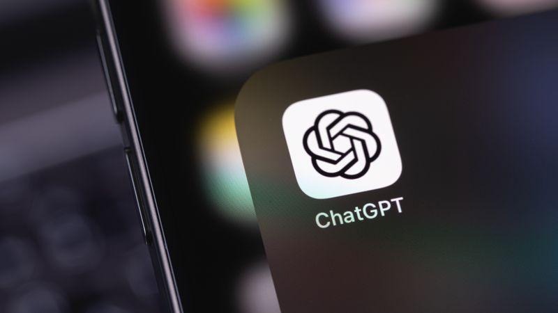 The ChatGPT app icon displayed on a mobile phone, representing easy access to AI-powered conversations and tasks.