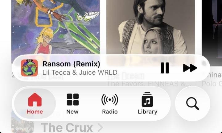 Screenshot of a music streaming app interface, showing "Ransom (Remix)" by Lil Tecca & Juice WRLD playing at the bottom. The player bar includes play/pause and skip controls. Above it are album covers or promotional images, and the bottom navigation bar displays icons for Home, New, Radio, and Library.
