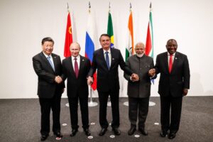 De-Dollarization Accelerates as Iran's Hormuz Yuan Toll and BRICS Moves Challenge the Petrodollar System